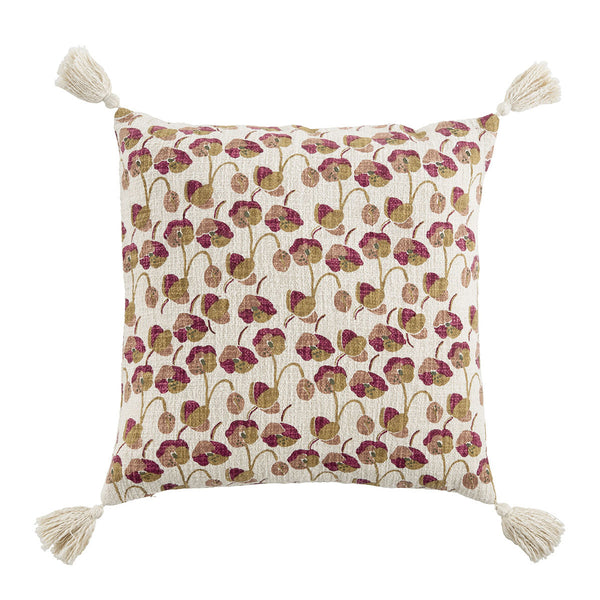 cushion with floral pattern on natural coloured fabric with tassels